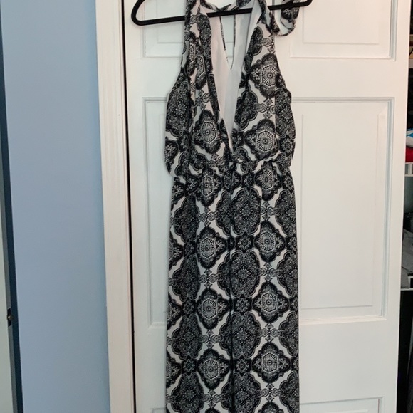 Flirty high low  romper with exposed shorts - Picture 3 of 4